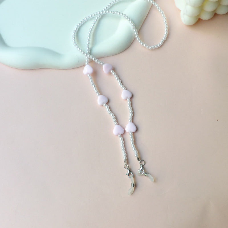 Fashionable pearl necklace with heart pendants Bowlift