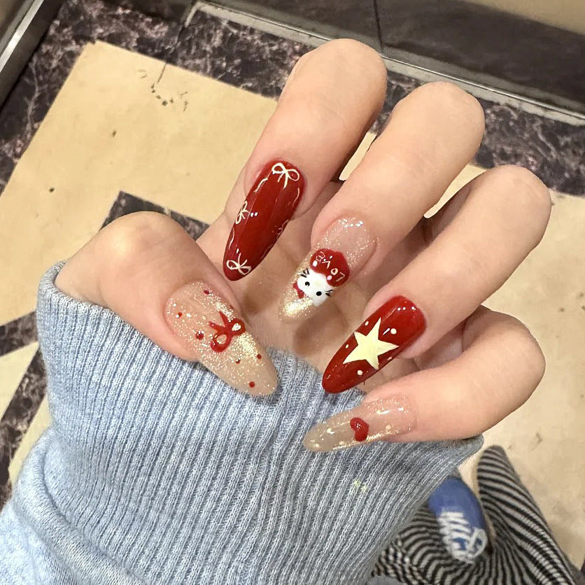 Artificial nails in festive Christmas design Bowlift