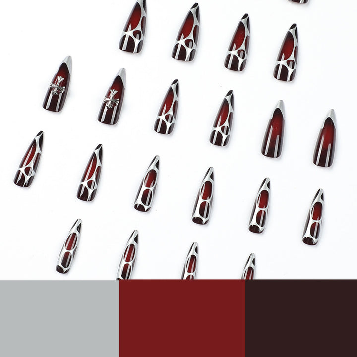 Artful Stiletto Nails with Elegant Cross Decoration Bowlift