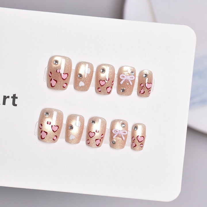 Artistic Press-On Nail Set with Heart and Bow Designs Bowlift