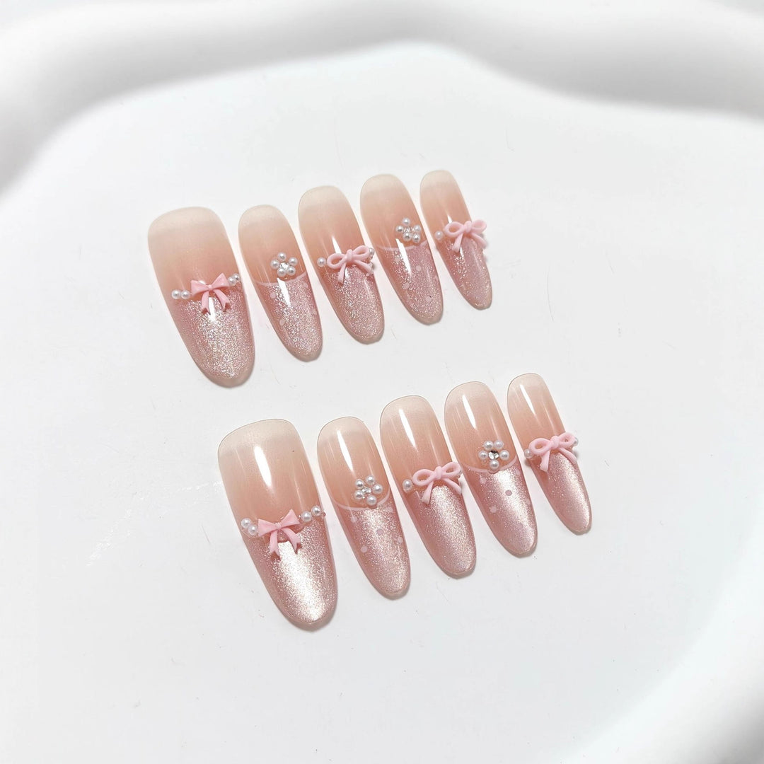 Elegant Artificial Nails with Delicate Gradients and Ribbons Bowlift