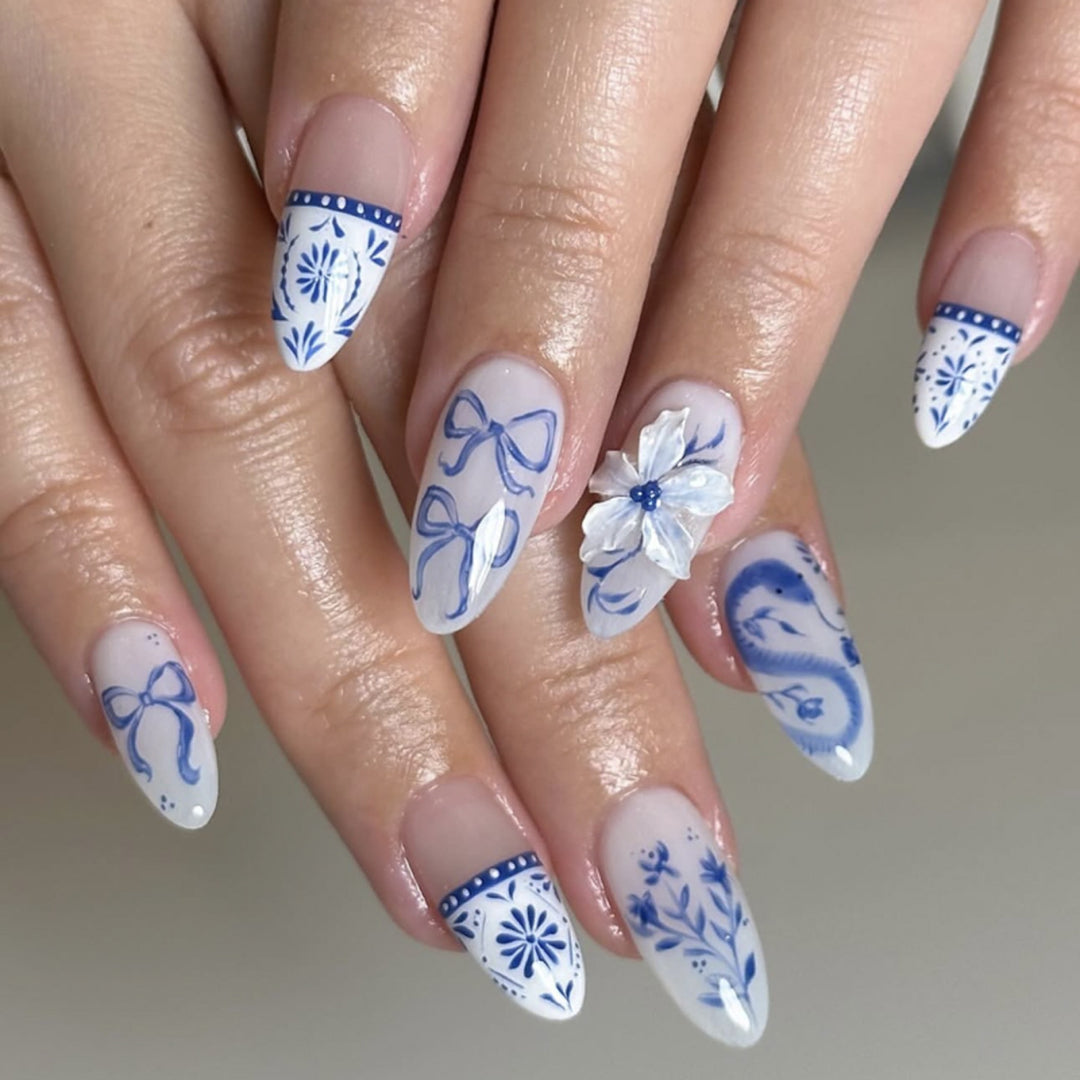 Artful nail art with floral and arch embellishments Bowlift