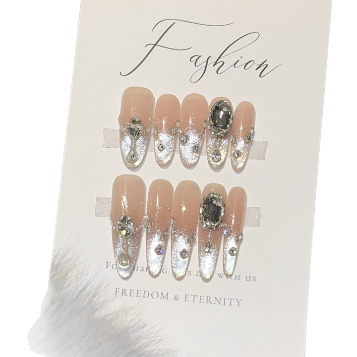 Glamorous artificial nail tips with rhinestone accents Bowlift