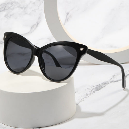 Ladies trendy cat-eye sunglasses with transparent frame and blue lenses Bowlift