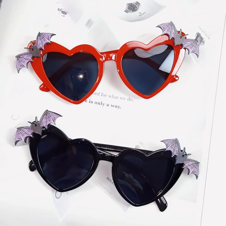 Heart-Shaped Sunglasses with Bat Accents Bowlift