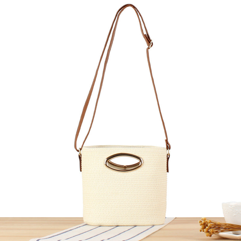 Shoulder bag made of handwoven natural material with elegant handle Bowlift