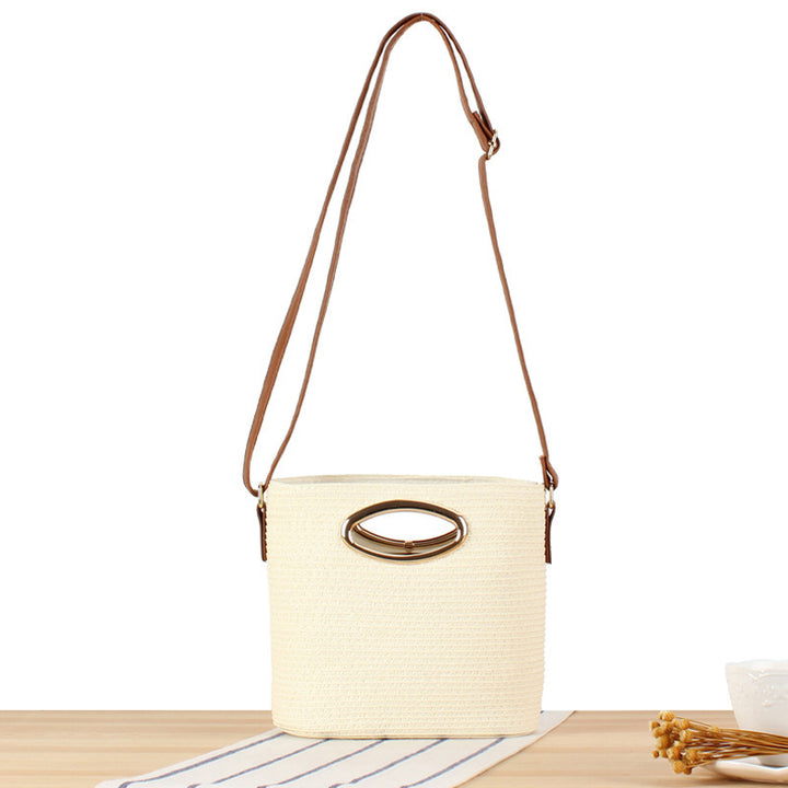 Shoulder bag made of hand-woven natural material with elegant ring closure Bowlift