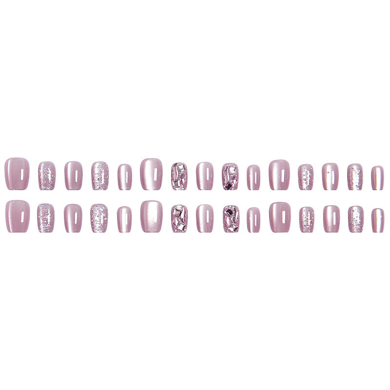 Artificial nail set with glitter and metallic effects Bowlift
