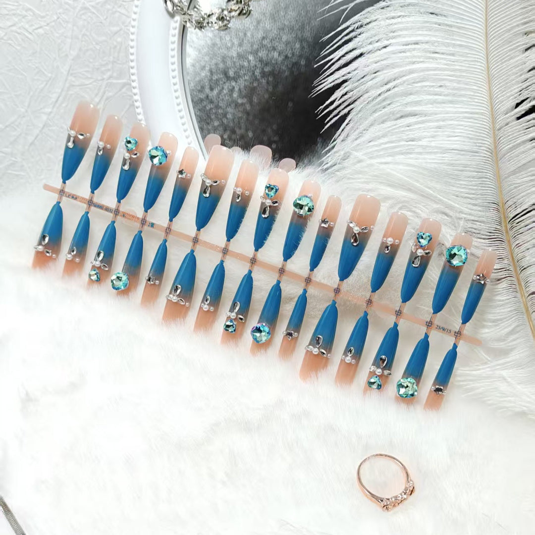 Glamorous artificial nails with sparkling rhinestone elements Bowlift