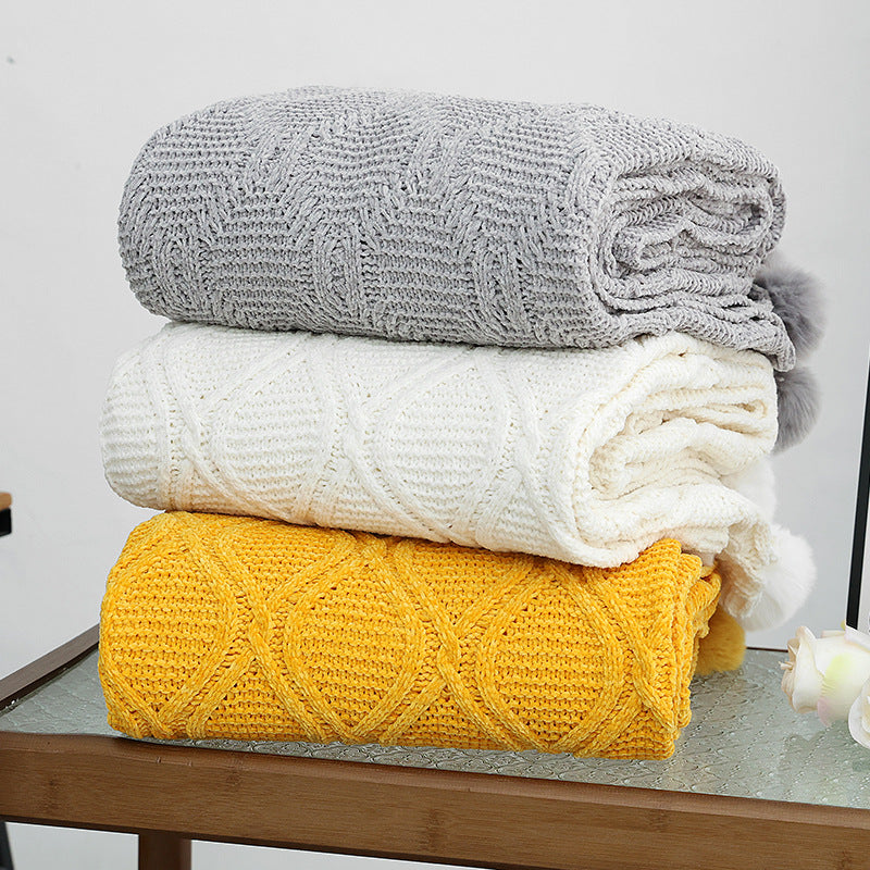 Ladies knit blanket with decorative pom poms Bowlift