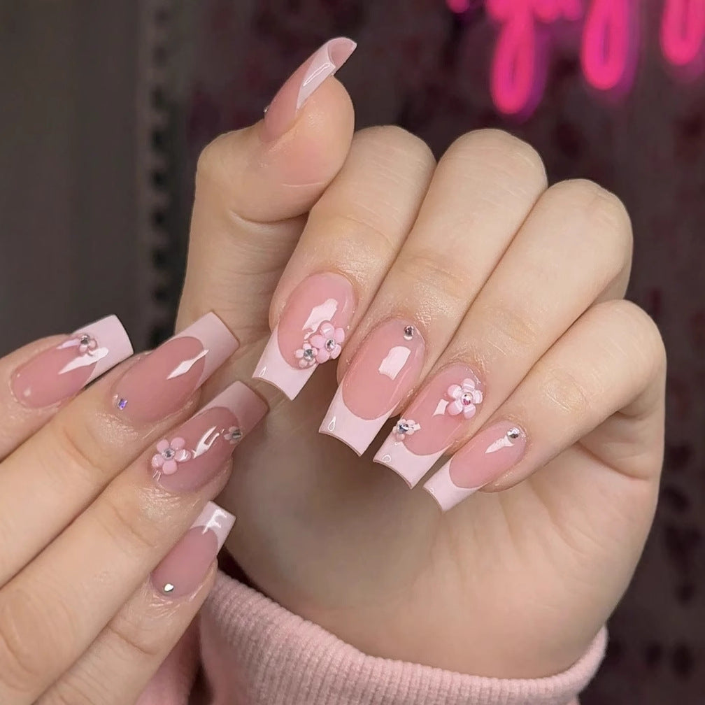 Artificial nail set with elegant 3D flowers and glamorous rhinestone accents Bowlift