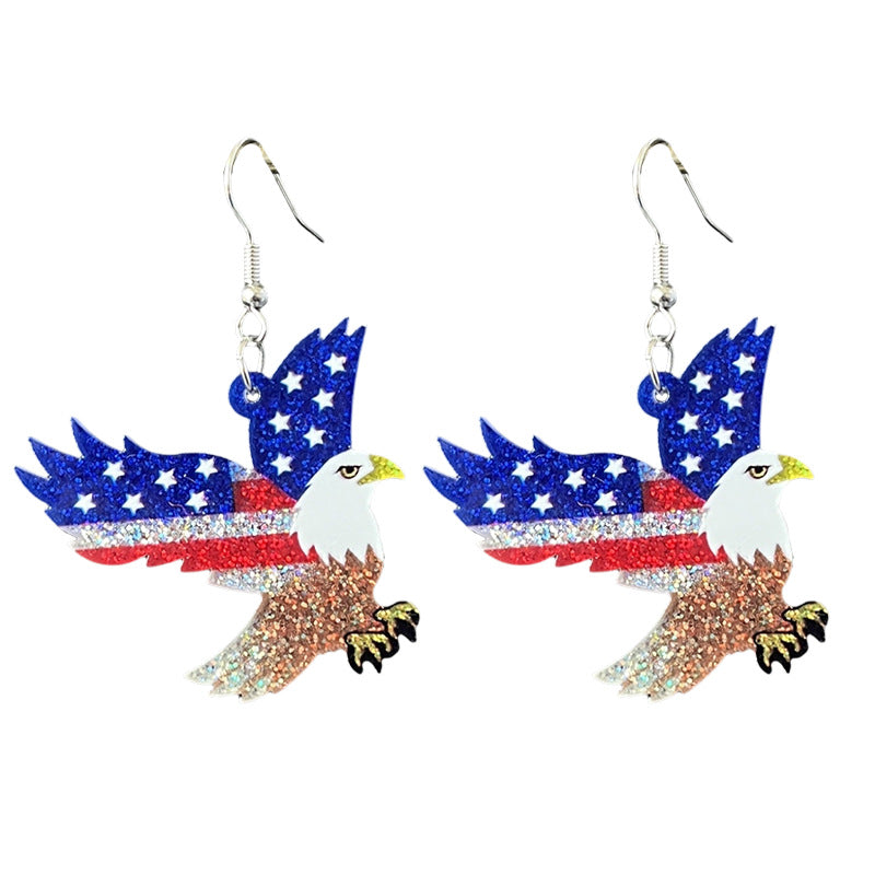 Women's shimmering statement earrings with star and fireworks design made of acrylic Bowlift