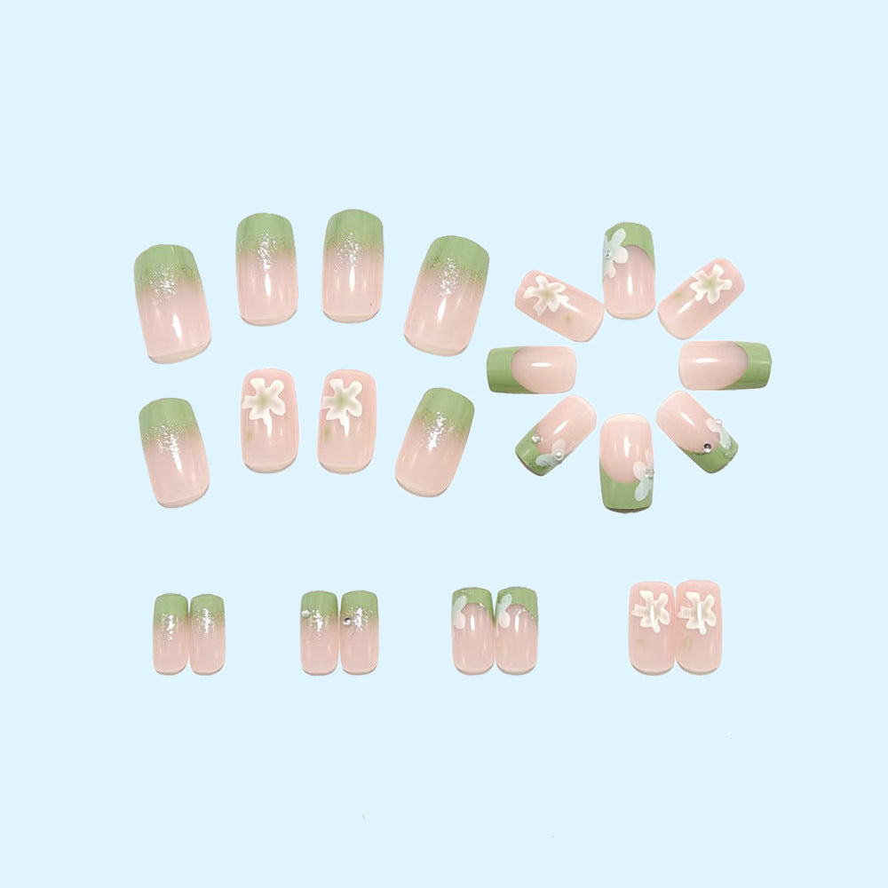 Artificial nails with floral accents and glitter coating Bowlift