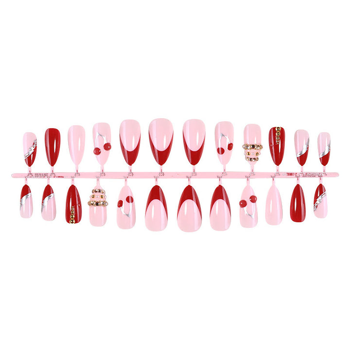 Artificial nail set with glamorous accents and cheerful patterns Bowlift