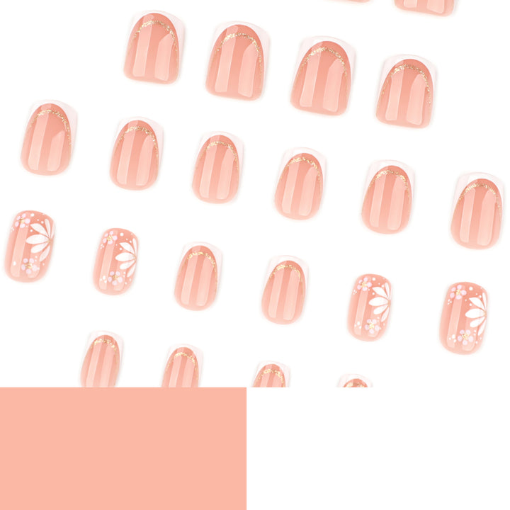 Artistic nail extensions with floral design and elegant accents Bowlift