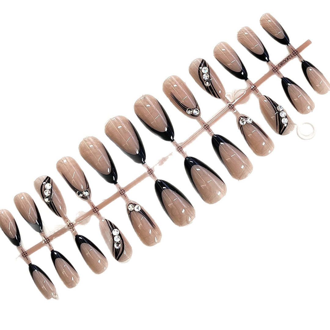 Elegant Press-On Nail Design with Rhinestone Accents Bowlift