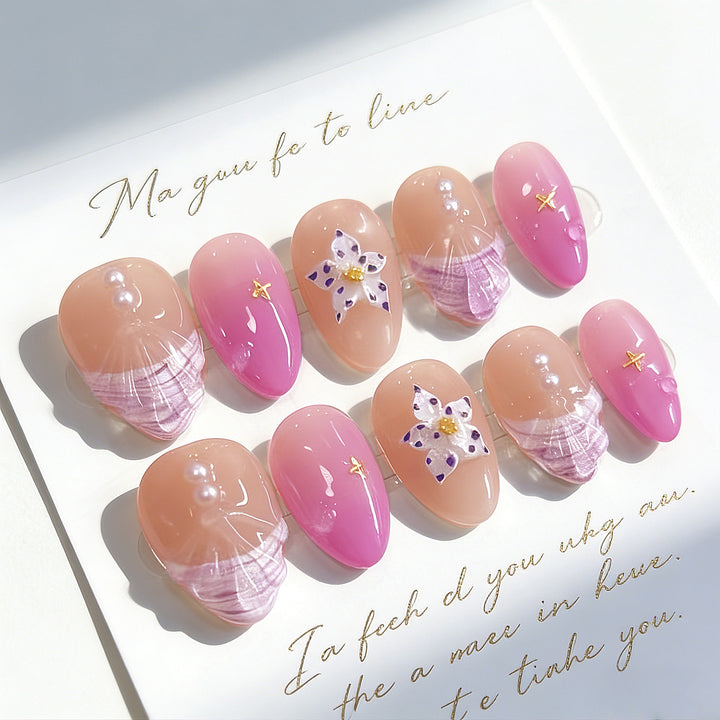 Artistic Press-On Nail Set with Star and Shell Accents Bowlift