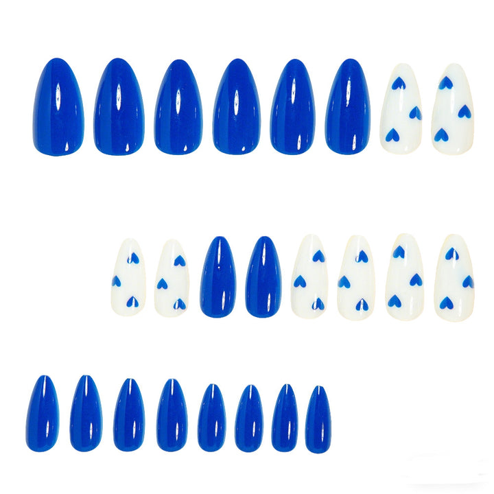 Stylish Long Stiletto Nail Art Tips with Heart Accents Bowlift