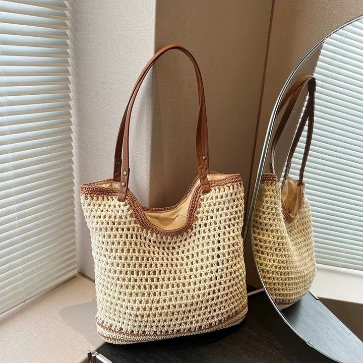 Braided beach bag with leather shoulder straps Bowlift