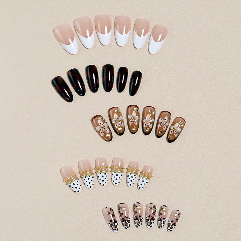 Exquisite nail art with elegant embellishments Bowlift
