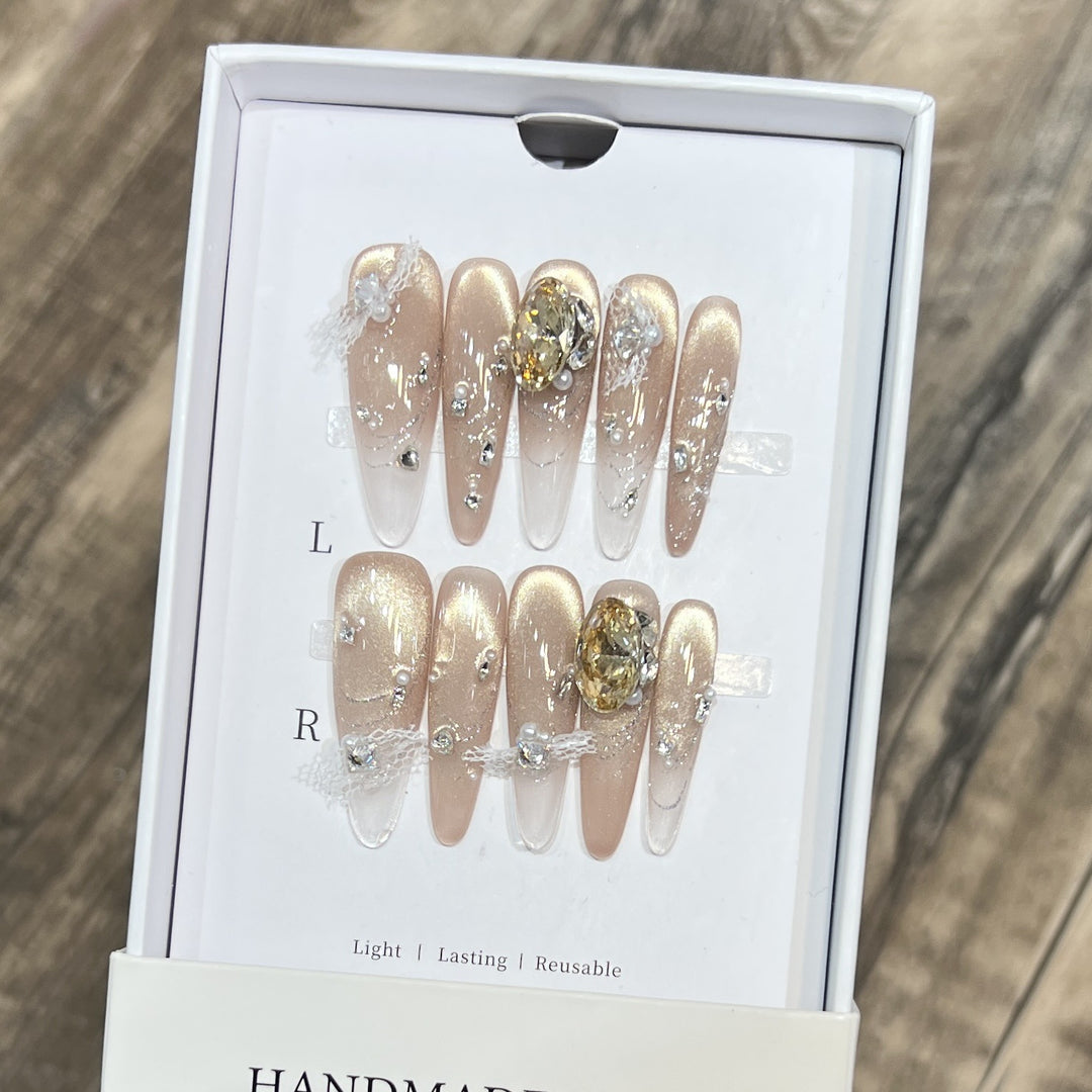 Elegant Stiletto Press-On Nail Set with Decorative Accents Bowlift