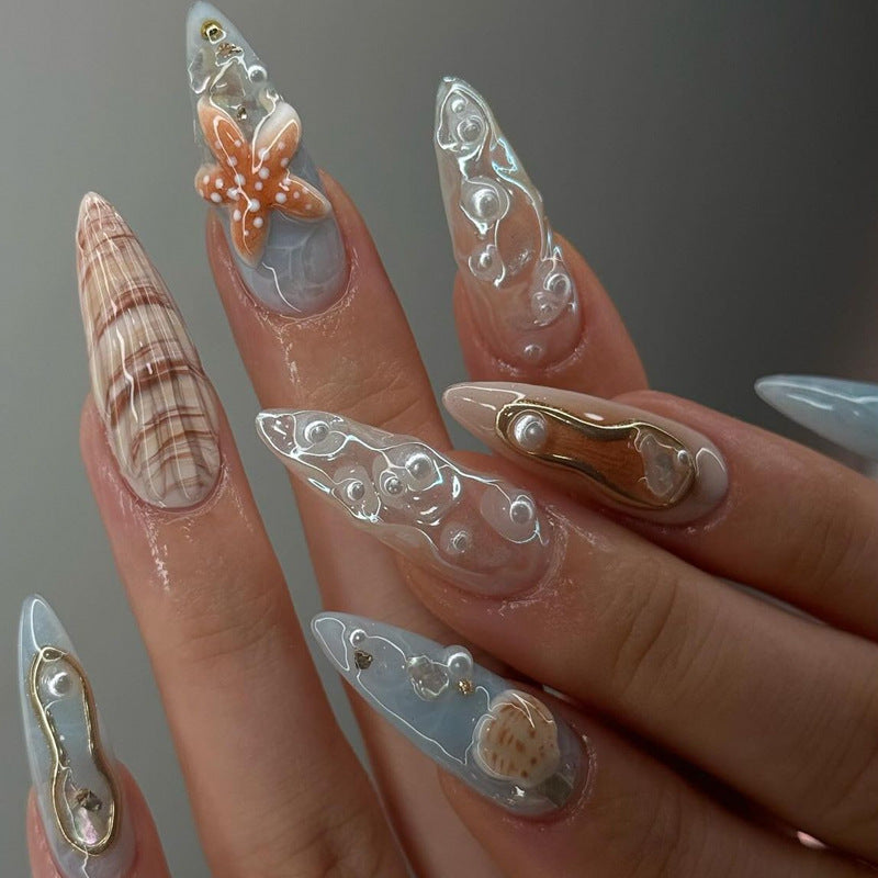 Artistic Press-On Nail Set with Shell and Floral Accents Bowlift
