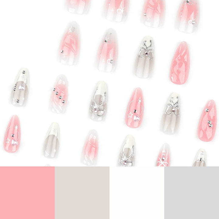 Artistic Nail Tips with Glitter and Bow Motifs Bowlift