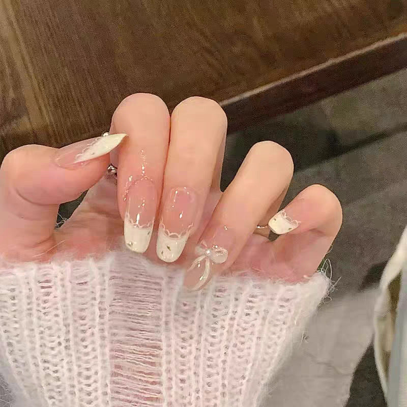 Artistic Press-On Nail Set with Elegant Floral and Gemstone Accents Bowlift