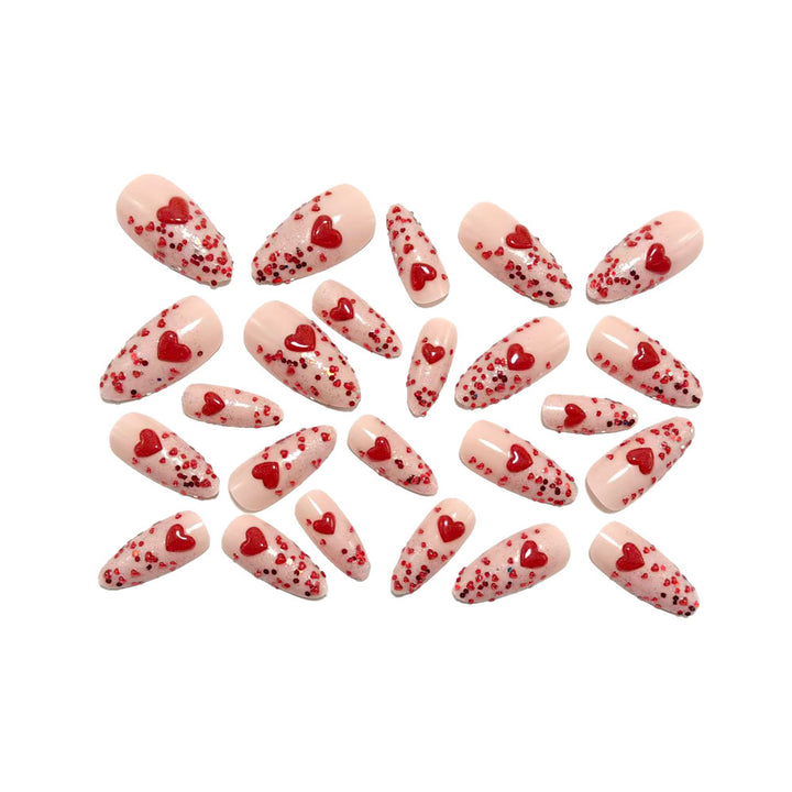 Glamorous artificial nails with heart design and glitter Bowlift