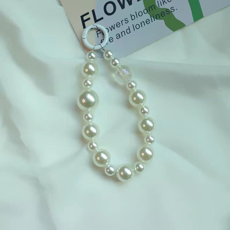 Elegant Pearl and Black Bead Charm Bracelet Bowlift