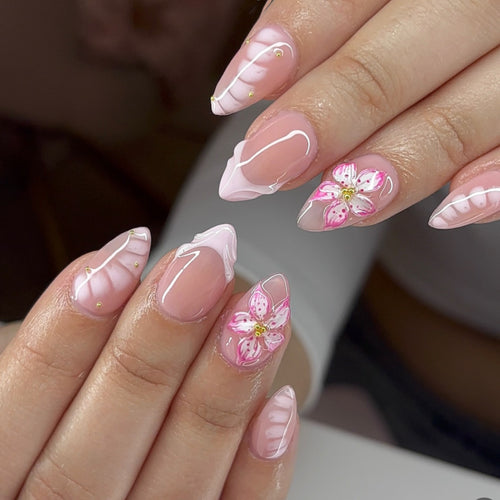 Artful Nail Extensions with Floral Design and Glitter Accents Bowlift