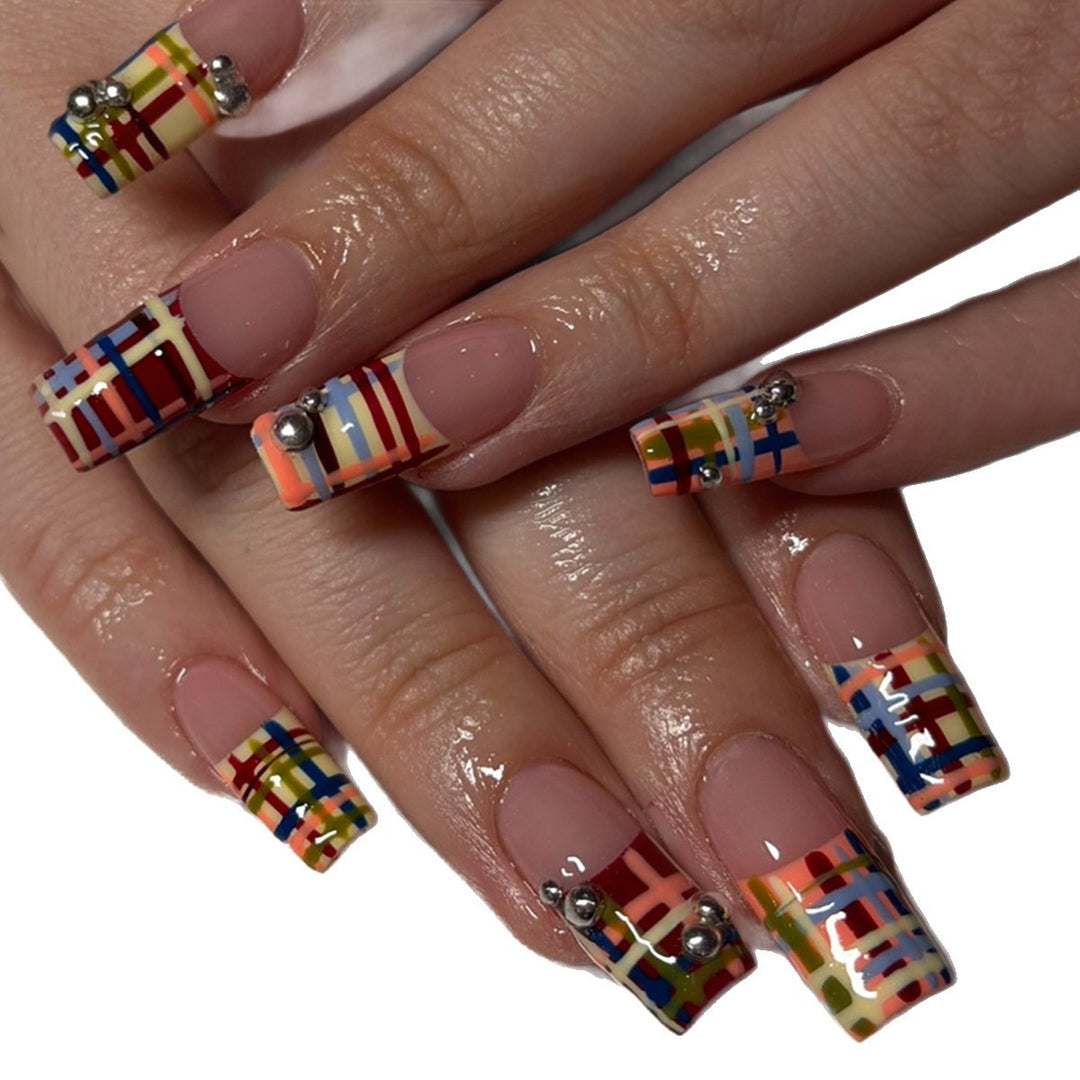 Artificial nails with geometric patterns and glossy accents Bowlift