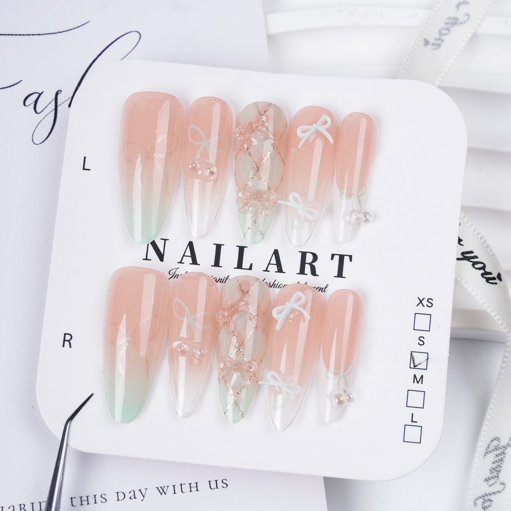 Artistic Long Stiletto Press-On Nails with Floral Accents Bowlift