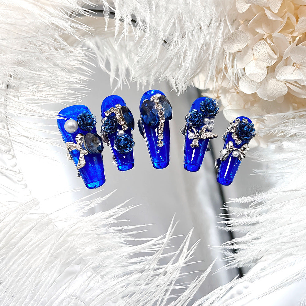 Glamorous artificial nails with floral decoration Bowlift