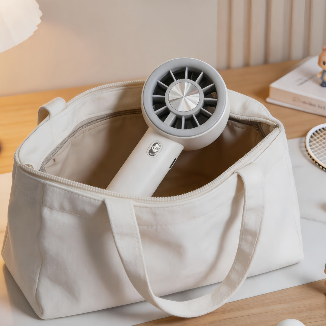 Portable handheld fan with ergonomic design and multiple speed modes Bowlift