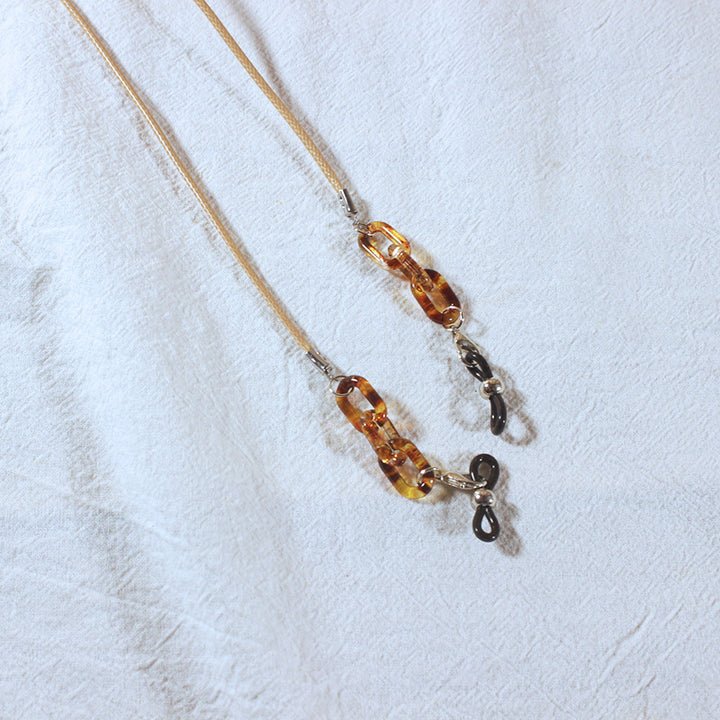 Fashionable glasses strap with pendants Bowlift