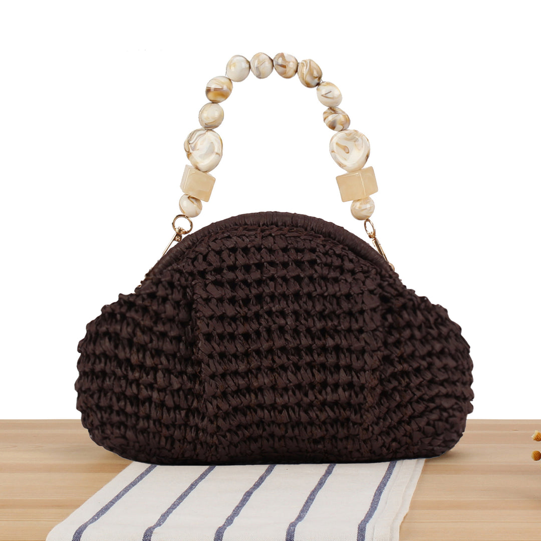 Handbag with innovative bead handle Bowlift