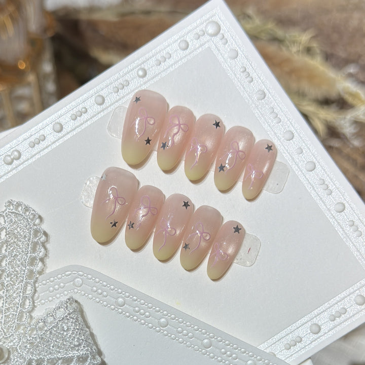 Press-On Nail Set with Bow and Star Accents Bowlift