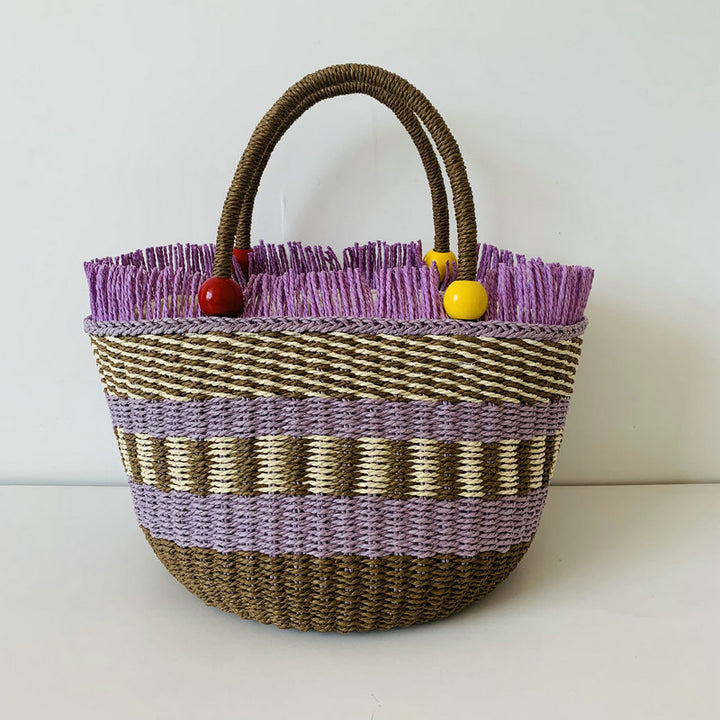 Generous braided tote bag with colorful fringed edge Bowlift