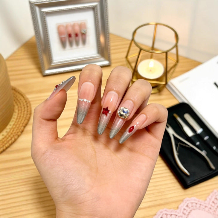 Sparkling artificial nails with decorative rhinestones Bowlift