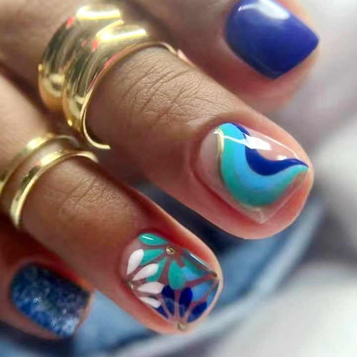 Artful nail design with floral and geometric patterns Bowlift
