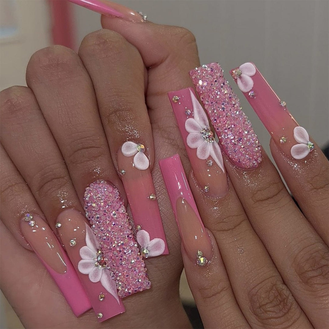 Glamorous artificial nail set with sparkling rhinestones and cross decorations Bowlift