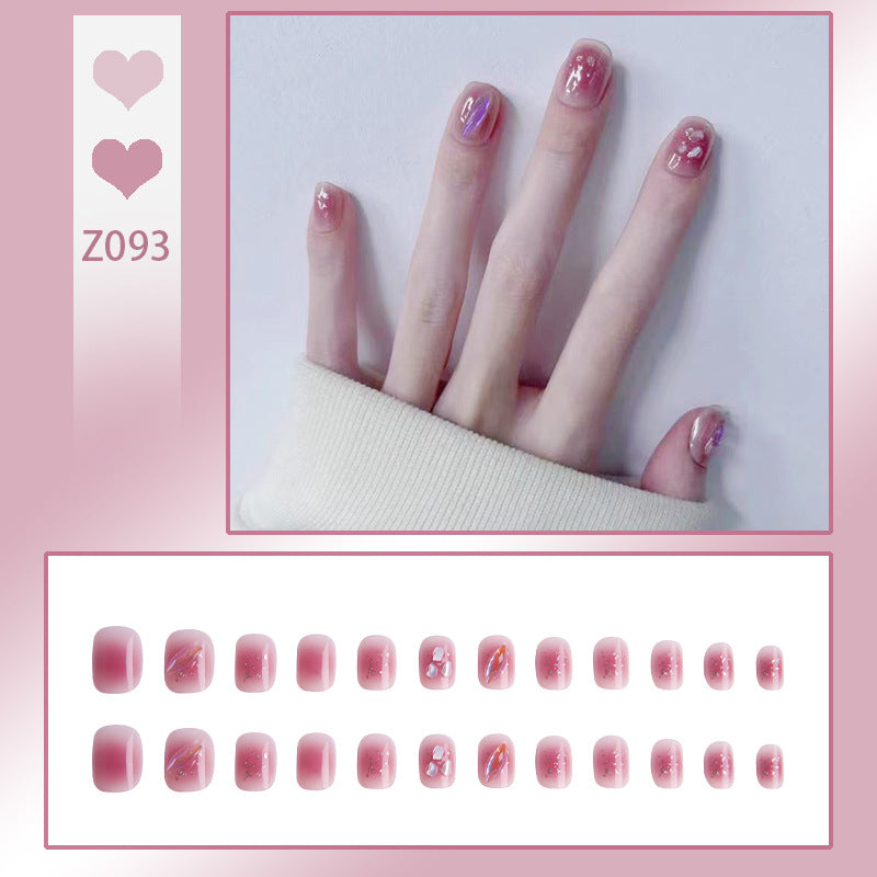 Artificial nails with delicate glitter design and floral accent Bowlift