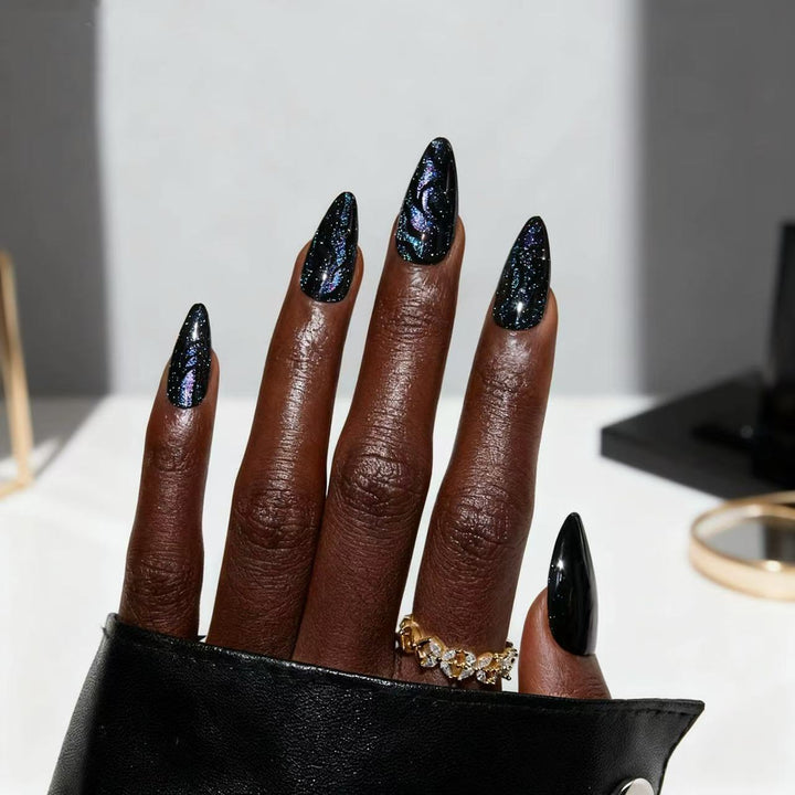 Artistic stiletto nails with shimmering effects Bowlift
