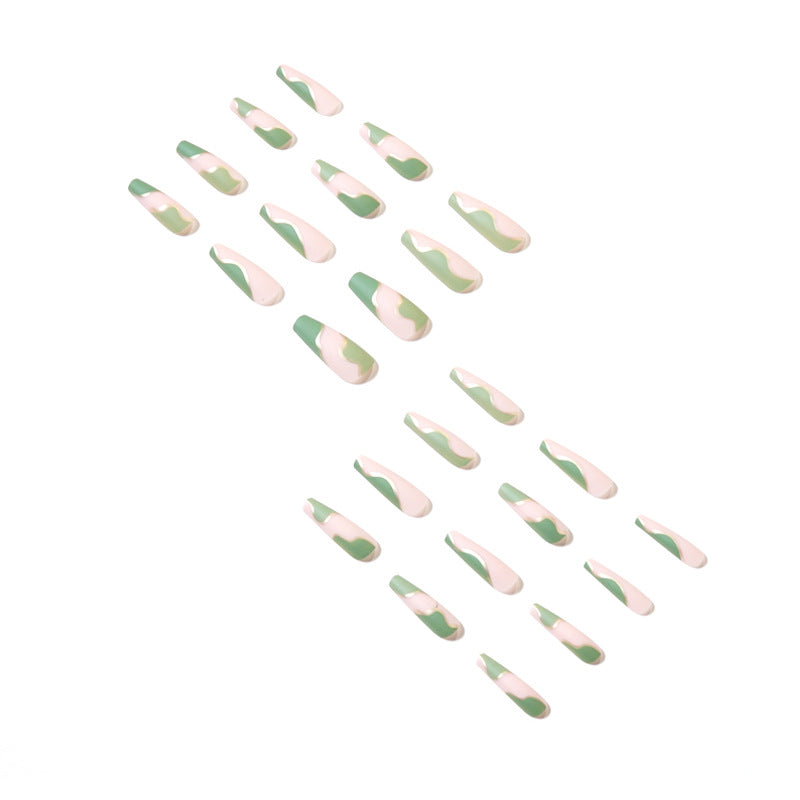 Artful Gel Nails with Elegant Wave Design and Gold Accents Bowlift