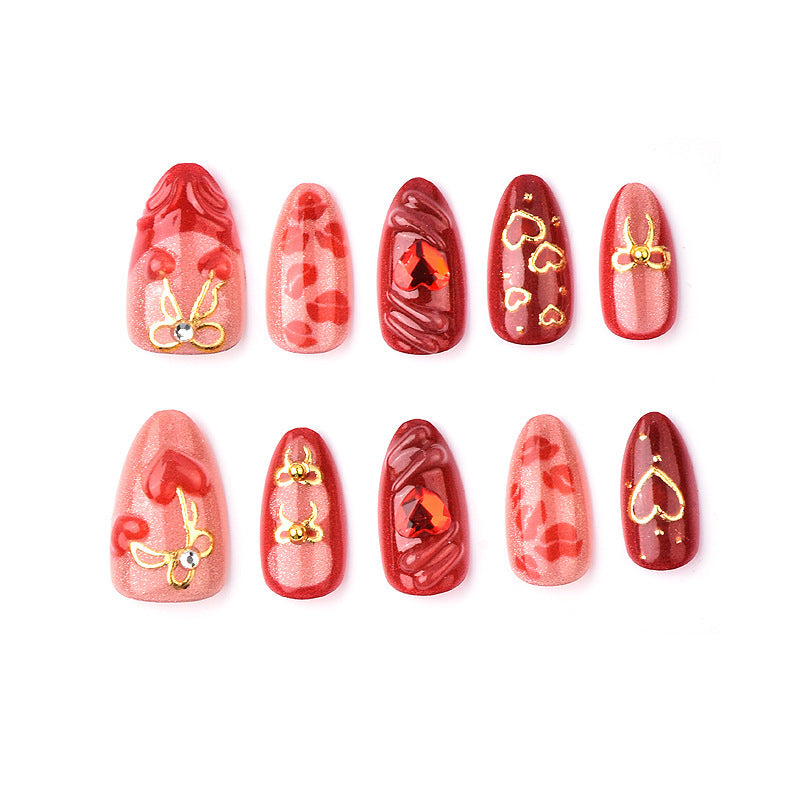Festive artificial nails with romantic heart designs Bowlift