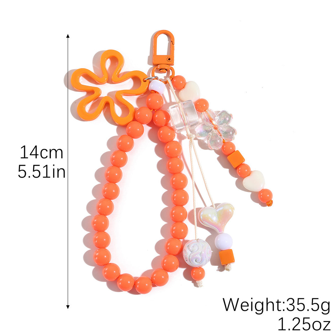 Playful keychain with flower and butterfly details Bowlift