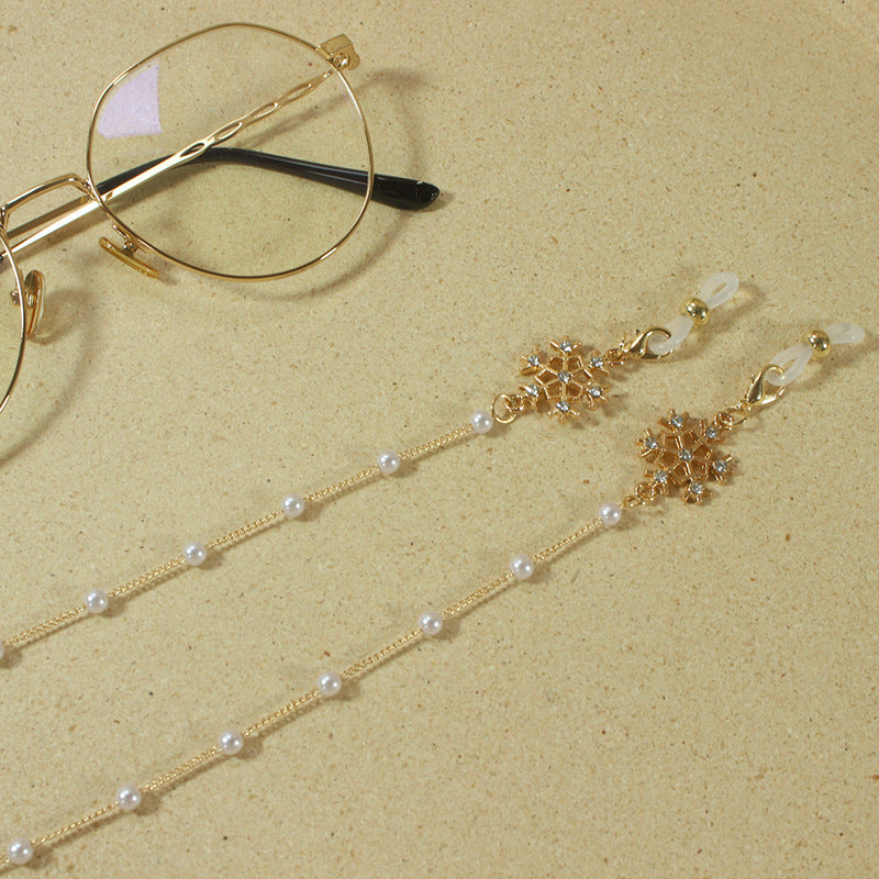 Elegant glasses holder chain with pearls and snowflake pendant Bowlift