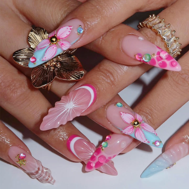 Creative nail art set with floral designs and decorative accents Bowlift