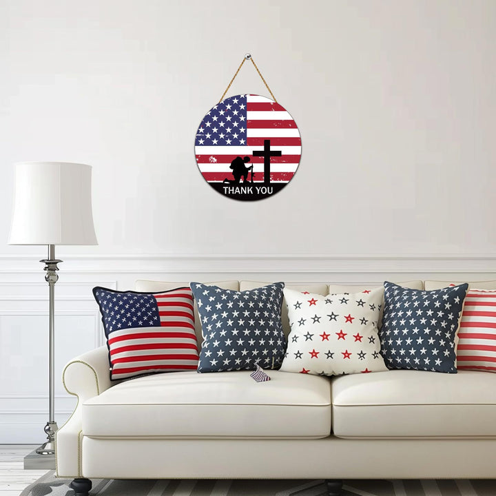 Unisex nan round wooden wall plaque with cross and soldier silhouette as well as jute rope hanging Bowlift